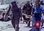 Image of wounded Marines Saipan Northern Mariana Islands, 1945, second 61 stock footage video 65675077540