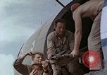 Image of wounded Marines Saipan Northern Mariana Islands, 1945, second 43 stock footage video 65675077541