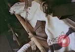 Image of wounded Marines Saipan Northern Mariana Islands, 1945, second 47 stock footage video 65675077541