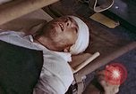 Image of wounded Marines Saipan Northern Mariana Islands, 1945, second 50 stock footage video 65675077541