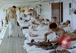 Image of wounded Marines Pacific Ocean, 1945, second 4 stock footage video 65675077542