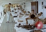 Image of wounded Marines Pacific Ocean, 1945, second 5 stock footage video 65675077542