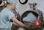 Image of wounded Marines Pacific Ocean, 1945, second 9 stock footage video 65675077542
