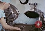 Image of wounded Marines Pacific Ocean, 1945, second 10 stock footage video 65675077542