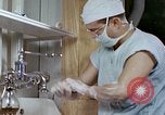 Image of wounded Marines Pacific Ocean, 1945, second 12 stock footage video 65675077542