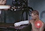 Image of wounded Marines Pacific Ocean, 1945, second 14 stock footage video 65675077542