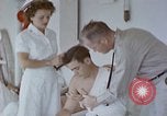 Image of wounded Marines Pacific Ocean, 1945, second 17 stock footage video 65675077542