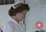 Image of wounded Marines Pacific Ocean, 1945, second 22 stock footage video 65675077542