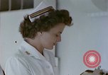 Image of wounded Marines Pacific Ocean, 1945, second 23 stock footage video 65675077542