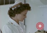 Image of wounded Marines Pacific Ocean, 1945, second 24 stock footage video 65675077542