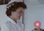 Image of wounded Marines Pacific Ocean, 1945, second 26 stock footage video 65675077542