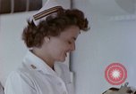 Image of wounded Marines Pacific Ocean, 1945, second 27 stock footage video 65675077542
