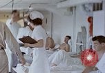 Image of wounded Marines Pacific Ocean, 1945, second 31 stock footage video 65675077542