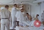 Image of wounded Marines Pacific Ocean, 1945, second 33 stock footage video 65675077542