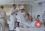 Image of wounded Marines Pacific Ocean, 1945, second 34 stock footage video 65675077542