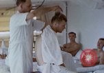 Image of wounded Marines Pacific Ocean, 1945, second 37 stock footage video 65675077542