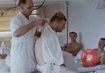 Image of wounded Marines Pacific Ocean, 1945, second 38 stock footage video 65675077542