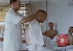 Image of wounded Marines Pacific Ocean, 1945, second 40 stock footage video 65675077542