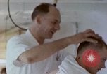 Image of wounded Marines Pacific Ocean, 1945, second 42 stock footage video 65675077542