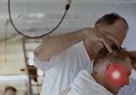 Image of wounded Marines Pacific Ocean, 1945, second 43 stock footage video 65675077542