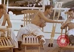 Image of wounded Marines Pacific Ocean, 1945, second 45 stock footage video 65675077542
