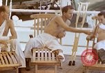 Image of wounded Marines Pacific Ocean, 1945, second 46 stock footage video 65675077542