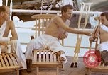 Image of wounded Marines Pacific Ocean, 1945, second 47 stock footage video 65675077542