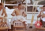 Image of wounded Marines Pacific Ocean, 1945, second 50 stock footage video 65675077542