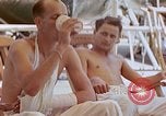 Image of wounded Marines Pacific Ocean, 1945, second 52 stock footage video 65675077542