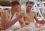 Image of wounded Marines Pacific Ocean, 1945, second 54 stock footage video 65675077542
