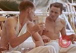 Image of wounded Marines Pacific Ocean, 1945, second 55 stock footage video 65675077542