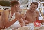 Image of wounded Marines Pacific Ocean, 1945, second 56 stock footage video 65675077542