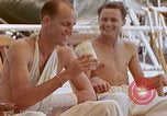 Image of wounded Marines Pacific Ocean, 1945, second 57 stock footage video 65675077542