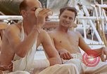 Image of wounded Marines Pacific Ocean, 1945, second 59 stock footage video 65675077542