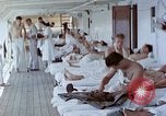 Image of wounded Marines Pacific Ocean, 1945, second 61 stock footage video 65675077542