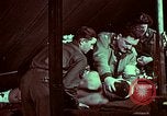 Image of wounded soldier European Theater, 1945, second 54 stock footage video 65675077543
