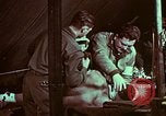 Image of wounded soldier European Theater, 1945, second 58 stock footage video 65675077543
