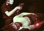 Image of wounded soldier European Theater, 1945, second 12 stock footage video 65675077544