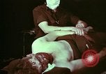 Image of wounded soldier European Theater, 1945, second 14 stock footage video 65675077544