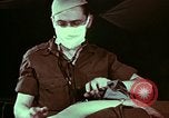 Image of wounded soldier European Theater, 1945, second 17 stock footage video 65675077544