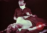 Image of wounded soldier European Theater, 1945, second 26 stock footage video 65675077544