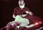 Image of wounded soldier European Theater, 1945, second 27 stock footage video 65675077544
