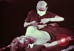 Image of wounded soldier European Theater, 1945, second 28 stock footage video 65675077544