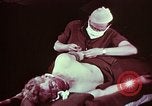 Image of wounded soldier European Theater, 1945, second 29 stock footage video 65675077544