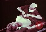 Image of wounded soldier European Theater, 1945, second 33 stock footage video 65675077544