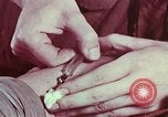 Image of wounded soldier European Theater, 1945, second 39 stock footage video 65675077544