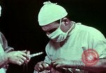 Image of wounded soldier European Theater, 1945, second 13 stock footage video 65675077545