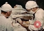 Image part le traitement des plaies Seconde Guerre Mondiale United States USA, 1945, de la seconde 18 séquences d'archives historiques vidéo 65675077550