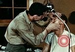 Image of eye surgery United States USA, 1945, second 30 stock footage video 65675077560