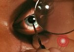 Image of eye surgery United States USA, 1945, second 40 stock footage video 65675077560